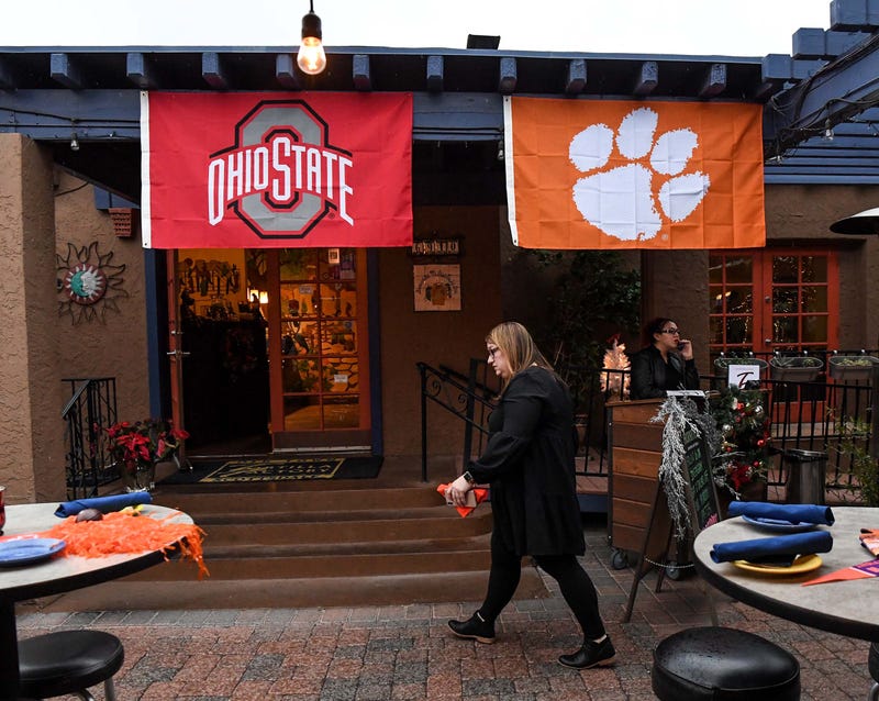 Christy Fletcher of Atlanta, working for Anthony Travel decorated for Clemson football fans who would attend the evening party at The Tortilla Factory in Scottsdale, Arizona Thursday December 26, 2019. Clemson Fans Fiesta Bowl