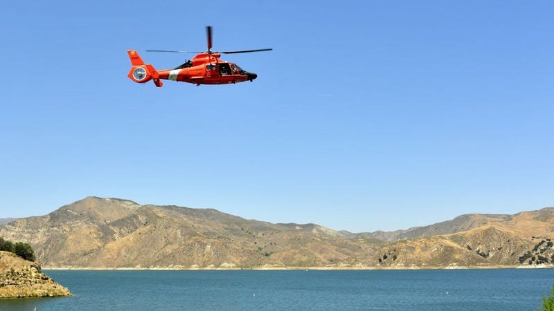 A U.S. Coast Guard helicopter flies over Lake Piru, where actress Naya Rivera was reported missing Wednesday, on July 9, 2020 in Piru, California.