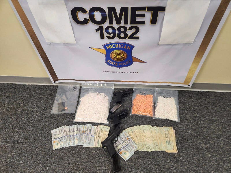 Pills, firearms and cash from the seizure