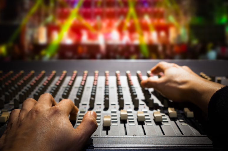 Sound engineer at a concert.