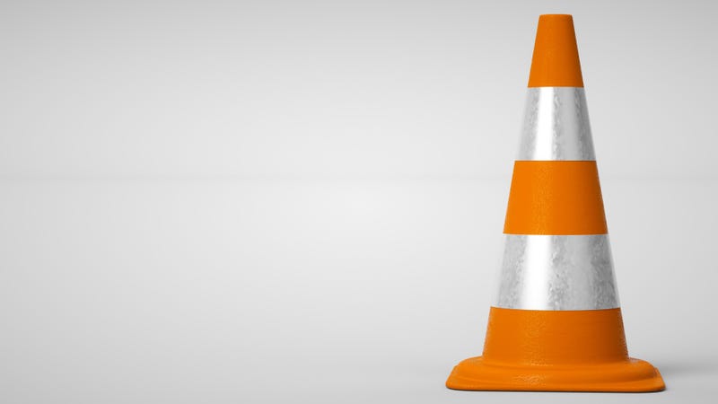 orange traffic cone on white background