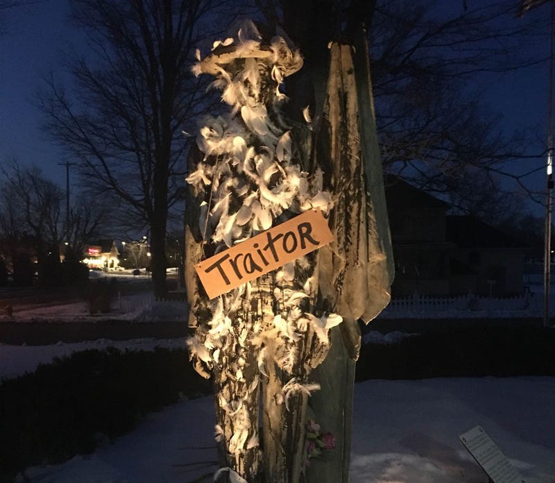 Four people in Michigan have been charged with defacing a Civil War statue