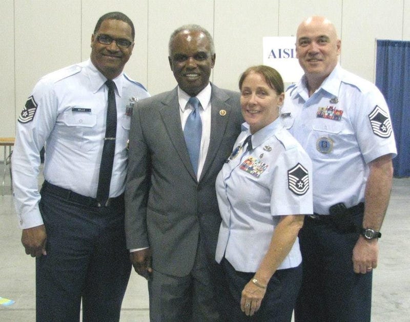 Congressman David Scott , shown with members of the military during a previous jobs fair, is hosting his 16th annual fair .
