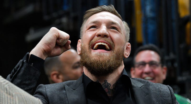 Irish mix martial artist Conor McGregor reacts after a first period goal by Boston Bruins center Patrice Bergeron (not seen) against the Columbus Blue Jackets at the TD Garden.