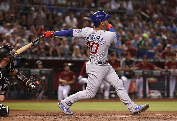 Willson Contreras watches a ball he hit against the Diamondbacks. 