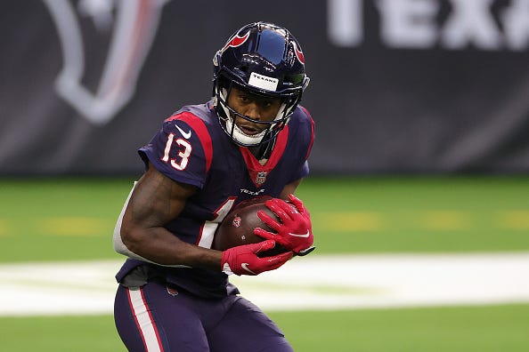 Brandin Cooks secures a pass with the Texans. 