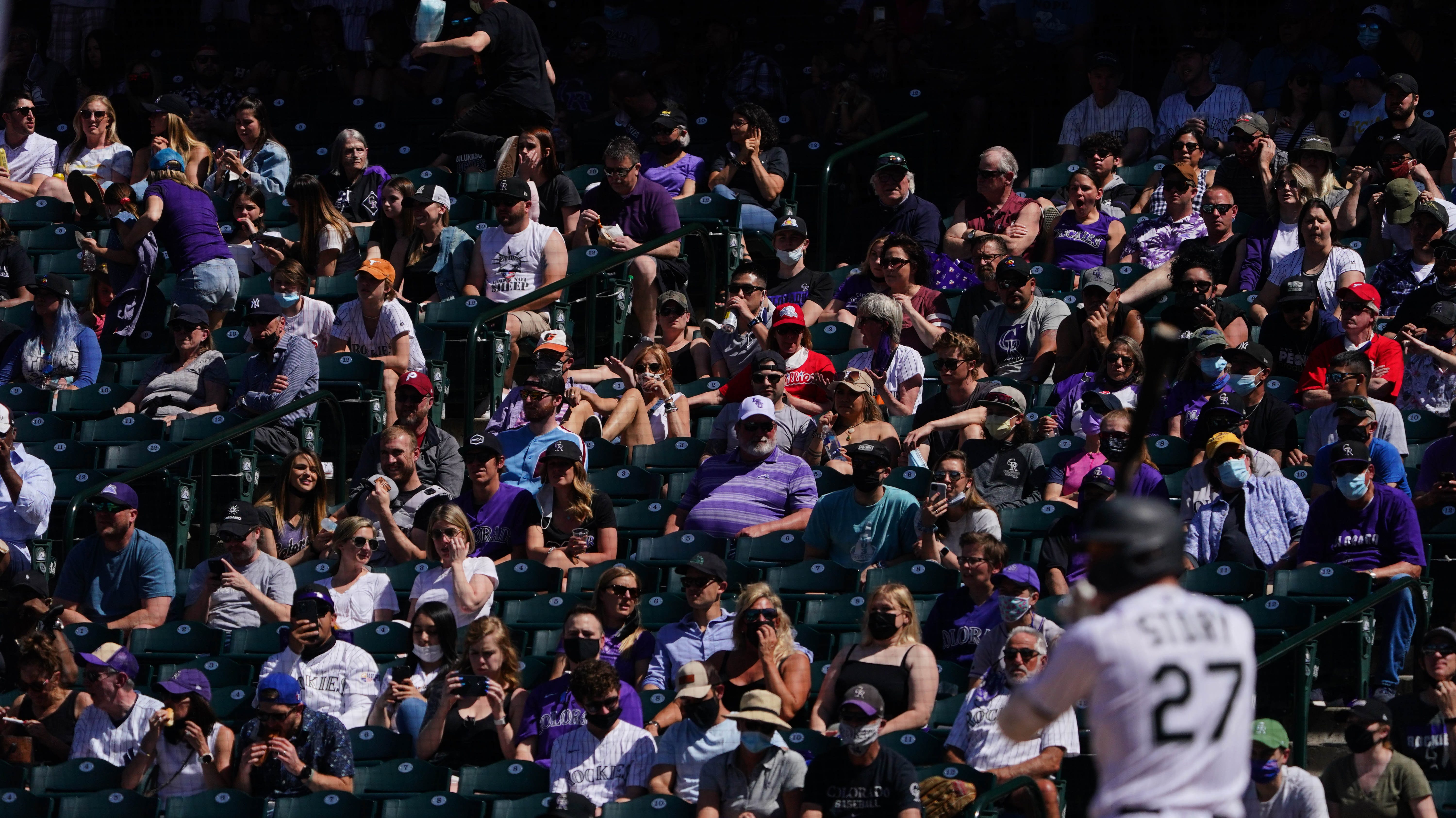 Padres fan knocks out Rockies fan with one punch in Coors Field incident