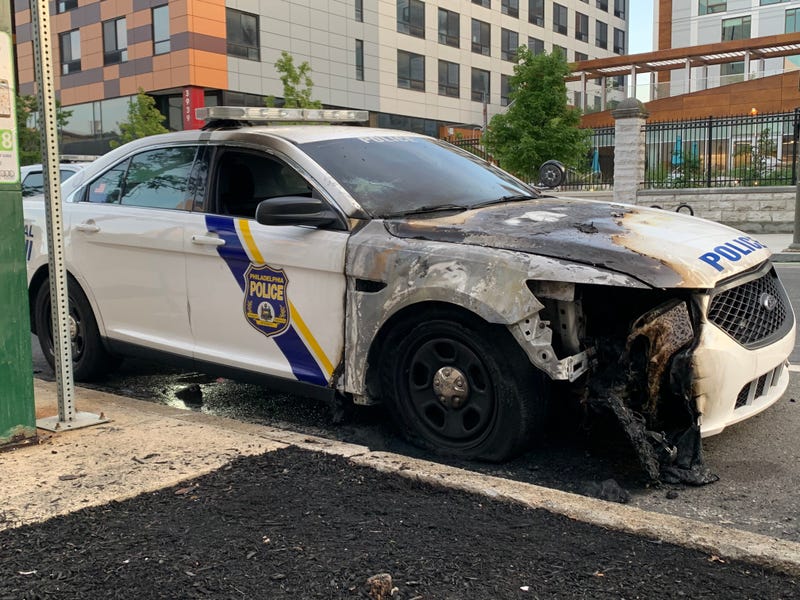 A police cruiser that was burned