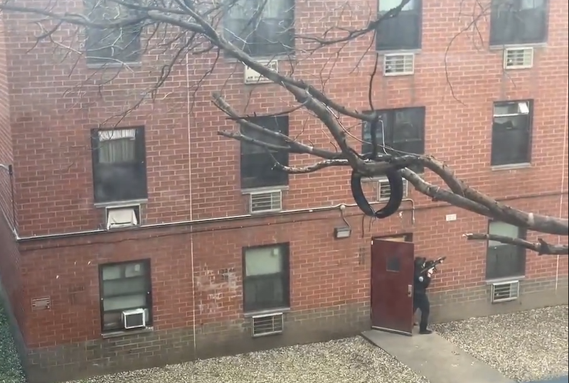 An armed man barricaded himself in a LES apartment building Thursday after officers attempted to arrest him.