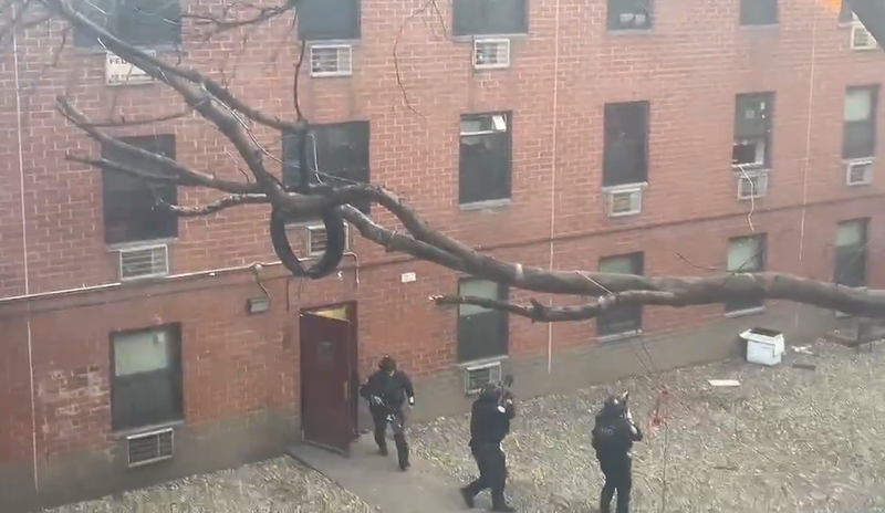 An armed man barricaded himself in a LES apartment building Thursday after officers attempted to arrest him.