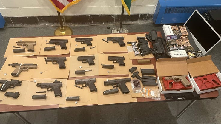 The firearms obtained from Cory Davis' apartments.