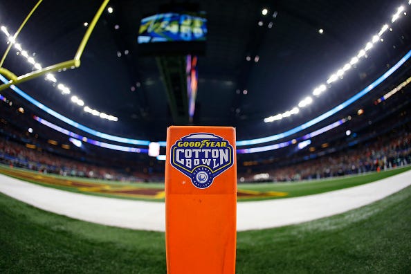 The Cotton Bowl logo is placed on a pylon behind the end zone. 