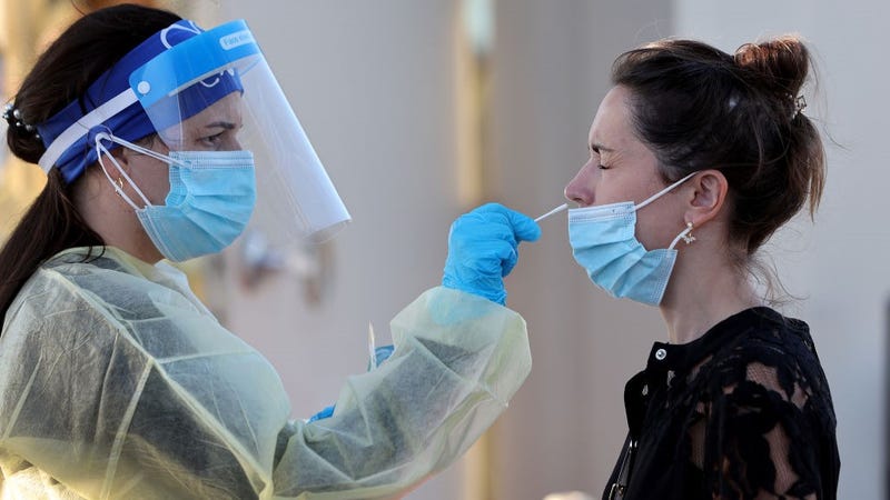  Jordane Domain gets a COVID-19 test done by a healthcare worker on January 13, 2022 in North Miami, Florida. 