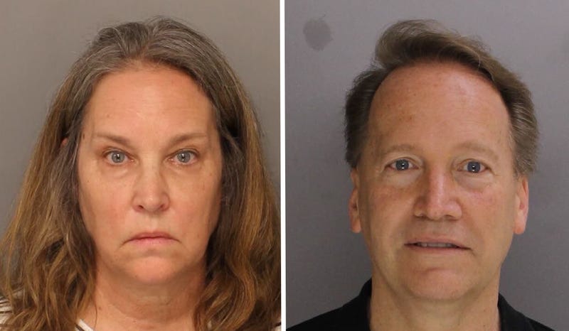 Mugshots of Leticia and Mark Cox