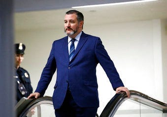 FILE - In this Jan. 29, 2020, file photo, Sen. Ted Cruz, R-Texas, rides an escalator before speaking with reporters on Capitol Hill in Washington. (AP Photo/Patrick Semansky, File)