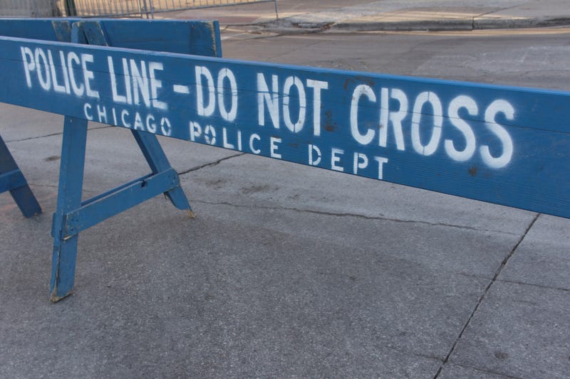 blue barricade set up by Chicago police