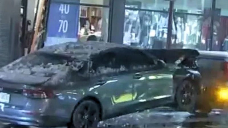 Car crashed through J. Crew