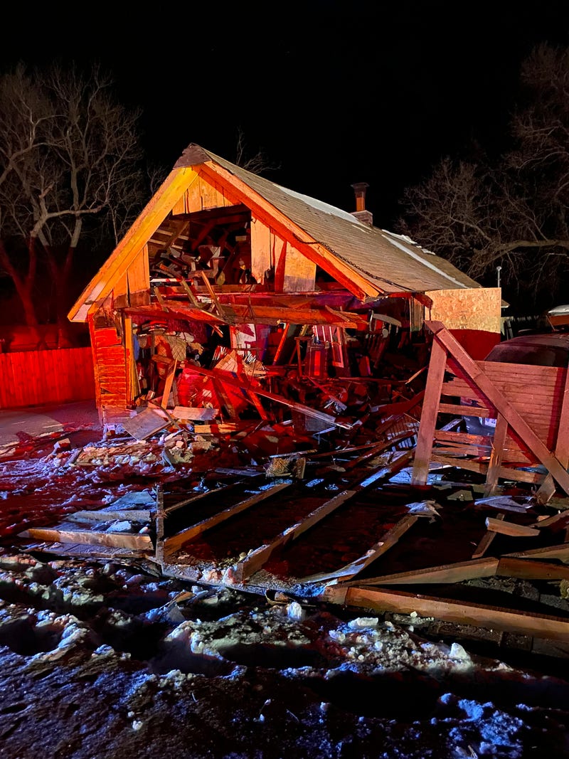 A woman was arrested after crashing her car into a house west of Gaylord