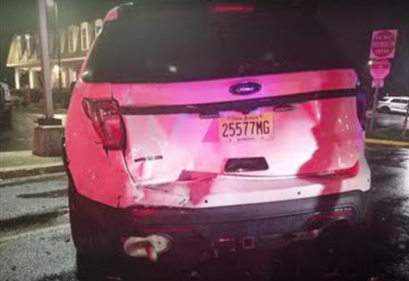 Police said an intoxicated driver slammed into the back of an unmarked police car (above) outside the Gloucester Township police headquarters on Aug. 7, 2023.