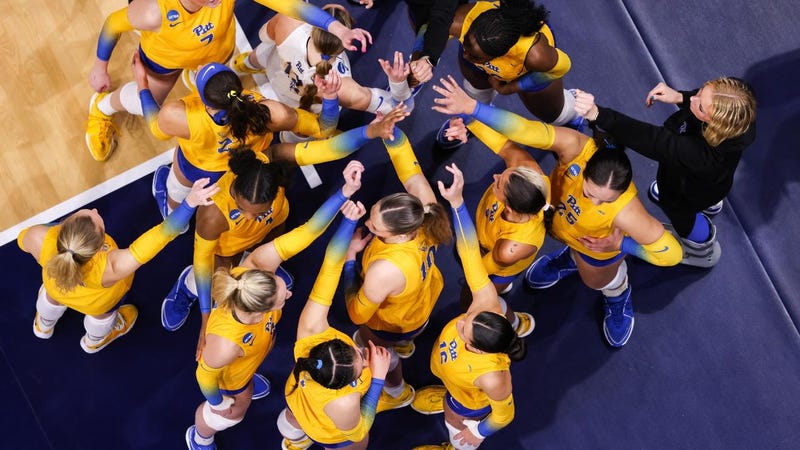 Pitt volleyball team huddled up