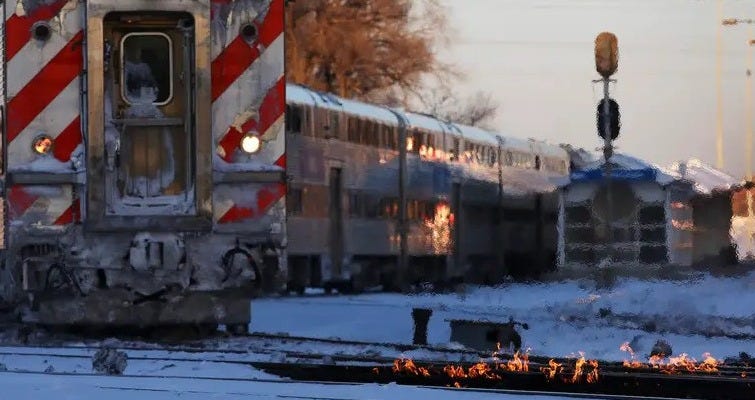 Metra trains go in and out of the Western Avenue Station in subzero temperatures on Tuesday, Jan. 29, 2019 in Chicago. The tracks are heated with gas-fired switch heaters that help prevent switching problems in extreme weather.