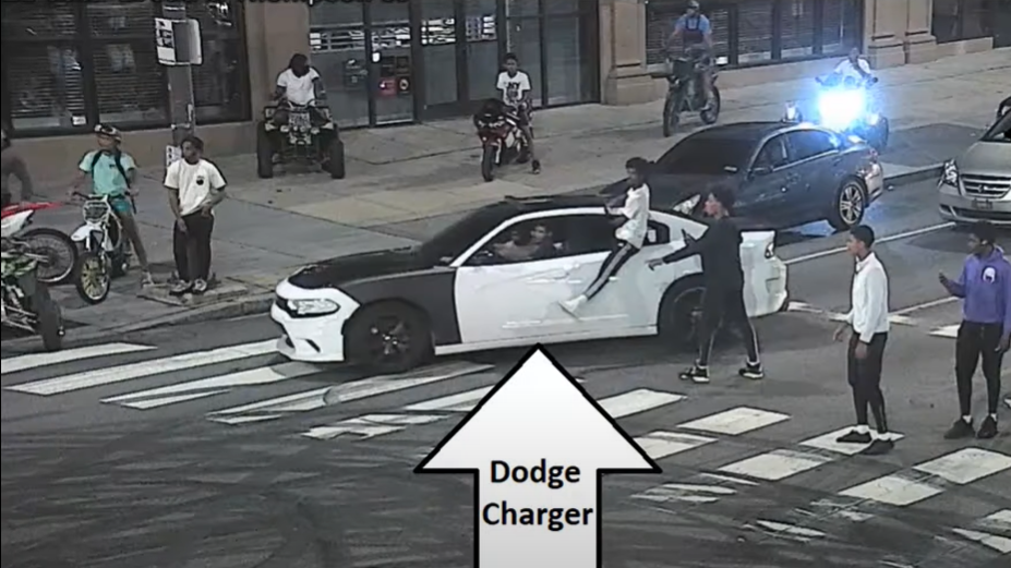 Video: Officer hit by car while trying to break up crowd of 500 people on North Broad Street