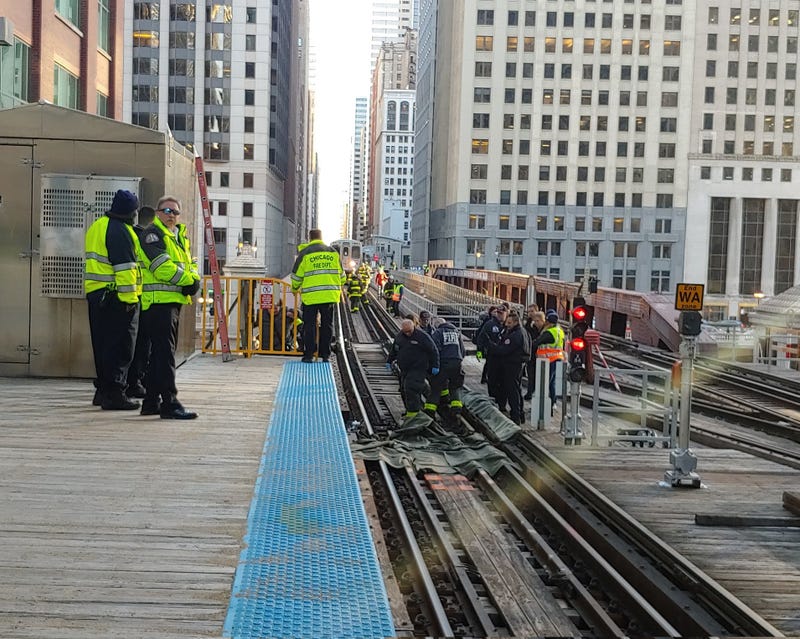 Brown Line tracks, firefighters on the tracks