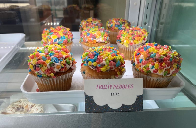 cupcakes in a glass display case