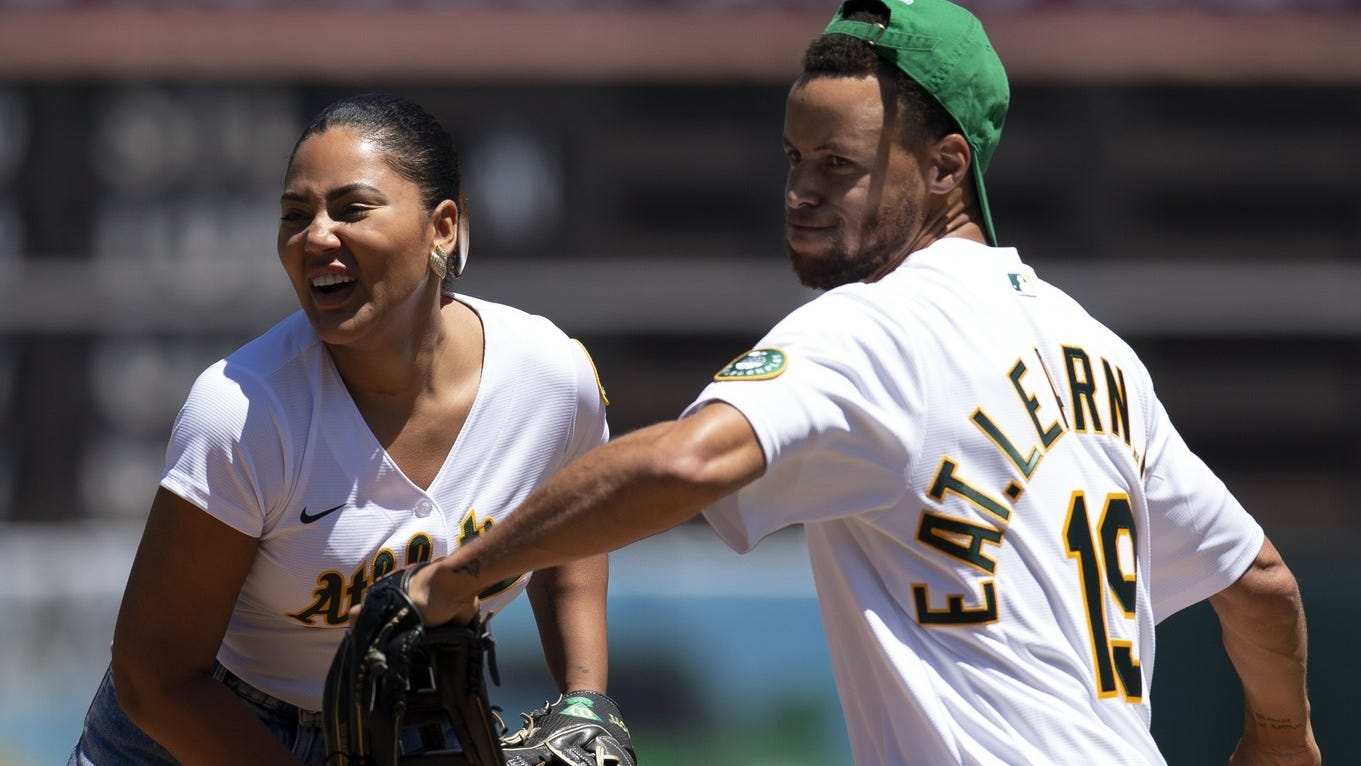 Steph Curry throws first pitch, takes BP, meets Dusty Baker before A's-Astros