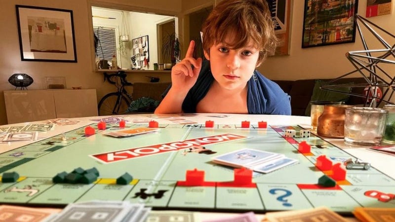 John's son Dawson playing Monopoly