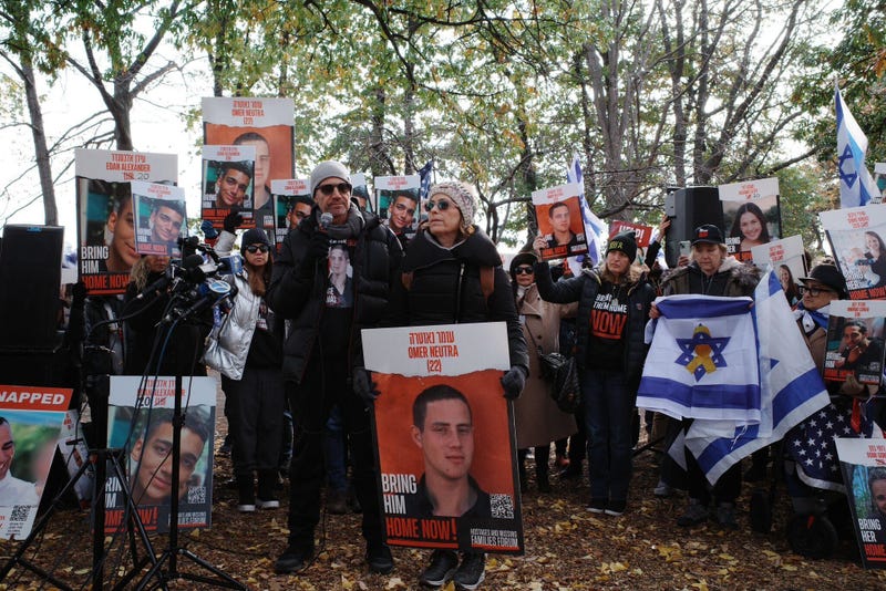 Orna and Ronen Neutra, parents of Omer Neutra, speak at Central Park on Dec. 1, 2024