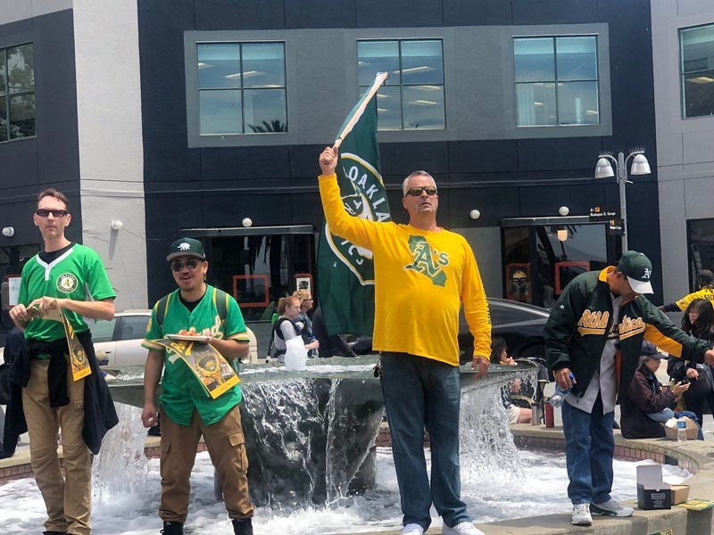 Oakland Athletics fans showed up at a vote by the Port of Oakland that offered initial approval to the plans for a new stadium near at Howard Terminal.