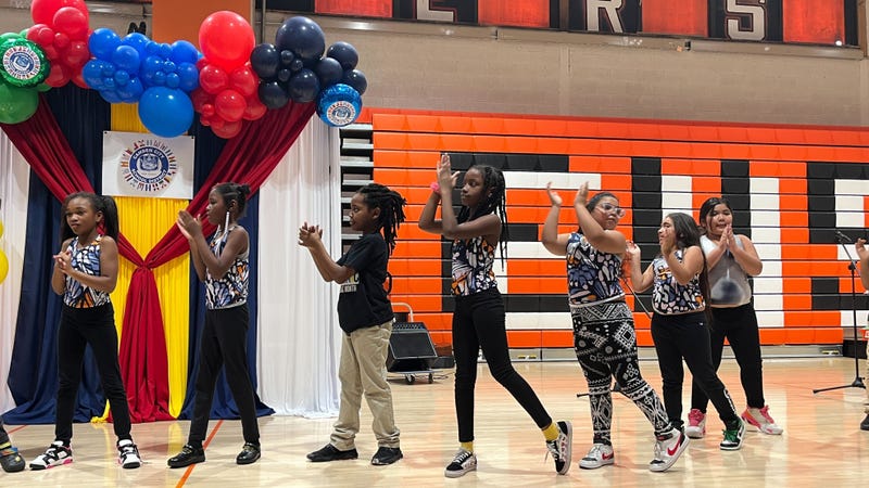 Students perform a dance at an event celebrating National Hispanic Heritage Month at Eastside High School in Camden, New Jersey.