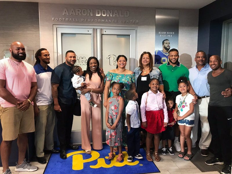 LA Rams defensive end Aaron Donald (green) at dedication of Aaron Donald Football Performance Center in June 2019