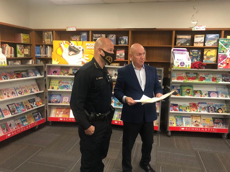 Dallas Police hand out gifts to students at book fair