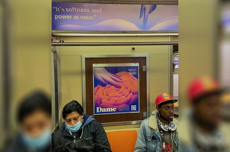 A Dame subway ad