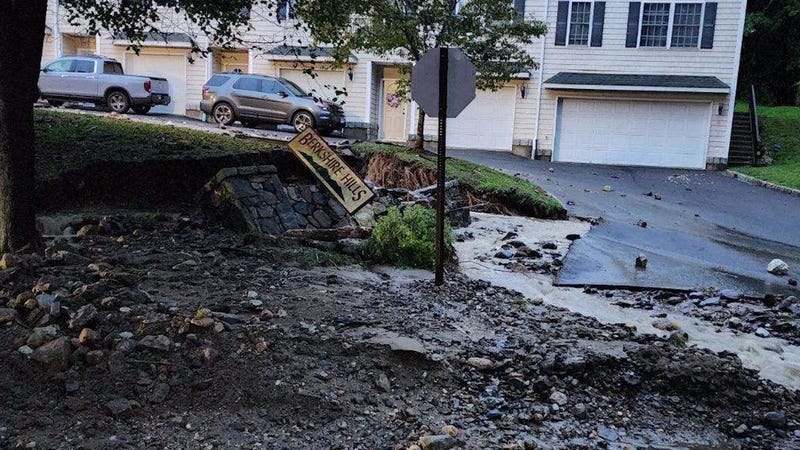 Road damage due to floodwaters in Danbury