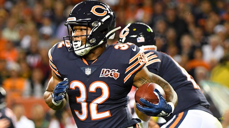 Bears running back David Montgomery carries the ball against the Packers.