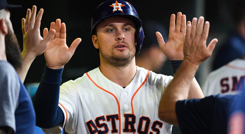 May 22, 2018; Houston, TX, USA; Houston Astros third baseman J.D. Davis (28) celebrates a run with teammates in the dugout during the seventh inning against the San Francisco Giants at Minute Maid Park. Mandatory Credit: Shanna Lockwood-USA TODAY Sports