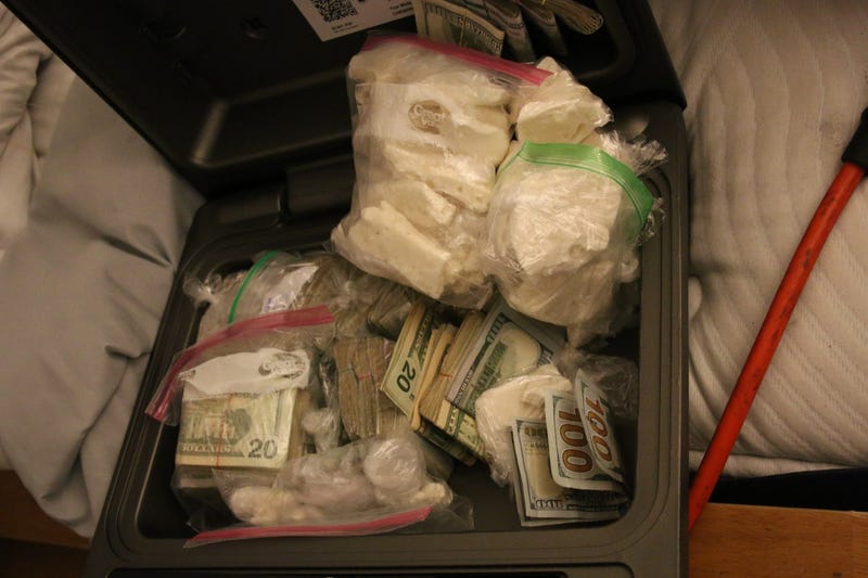 Officials found over a kilogram of cocaine, fentanyl and hundreds of thousands in cash at a Long Island man's residence.