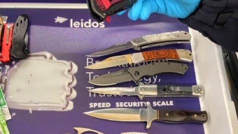 Man found with 23 weapons in carry-on at Virginia airport