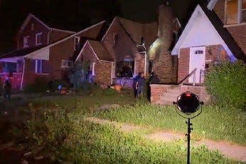 scene of a deadly Detroit house fire
