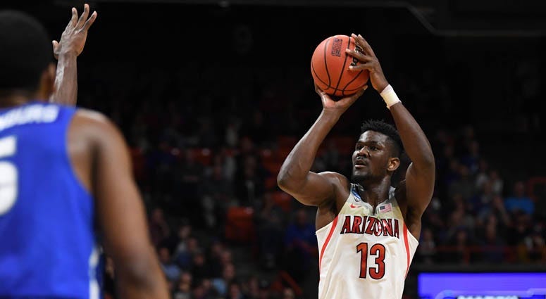 Arizona center DeAndre Ayton shoots against Buffalo in the NCAA tournament on March 15, 2018.