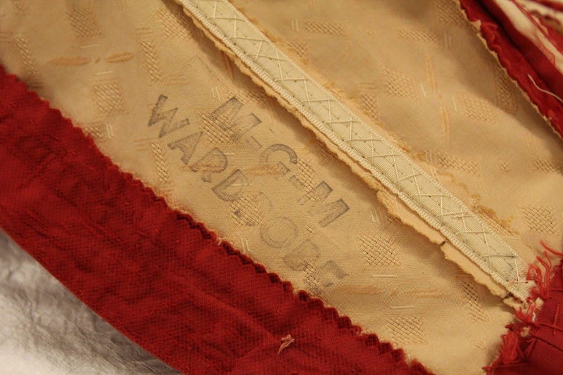 A dress worn by Judy Garland in Meet Me in St. Louis is on display