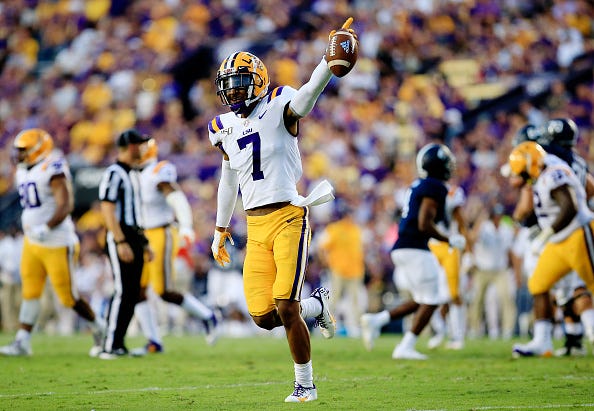 LSU S Grant Delpit celebrates an interception. 