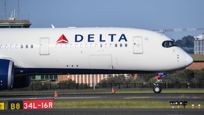  A Delta airlines aircraft landing from Los Angeles at Kingsford Smith International airport on October 31, 2021 in Sydney, Australia. 