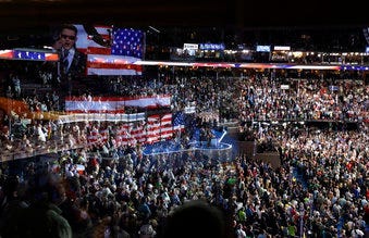 FILE - In this July 26, 2016, file photo the stage is reflected on a glass window on the suite level at Wells Fargo Arena in Philadelphia. (AP Photo/John Locher, File)