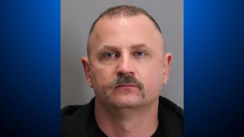 A San Jose community service officer who was already facing illegal weapons charges has been accused of possessing child pornography.