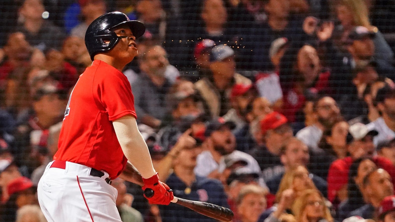 The same fan miraculously caught both Game 4 home run balls at Fenway Park