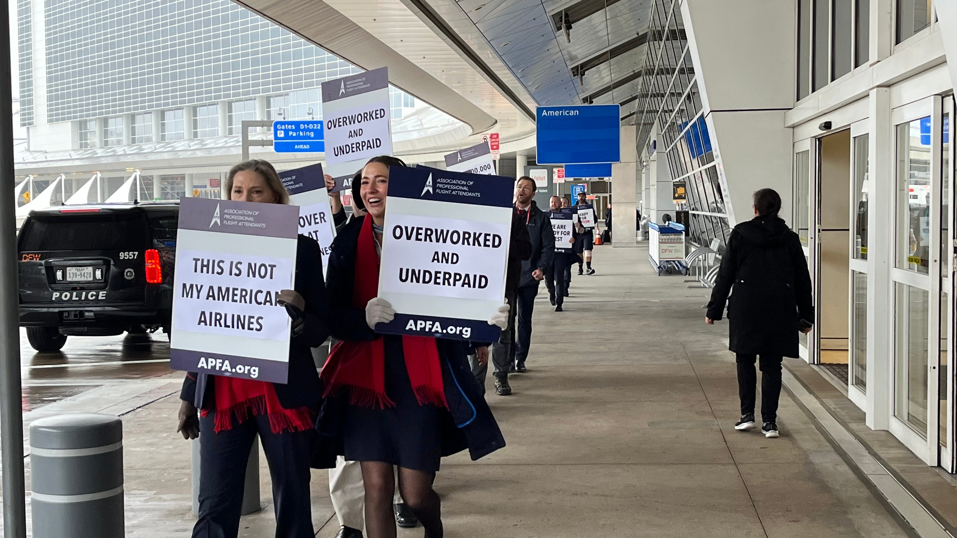 American Airlines flight attendants picket at airports across the country